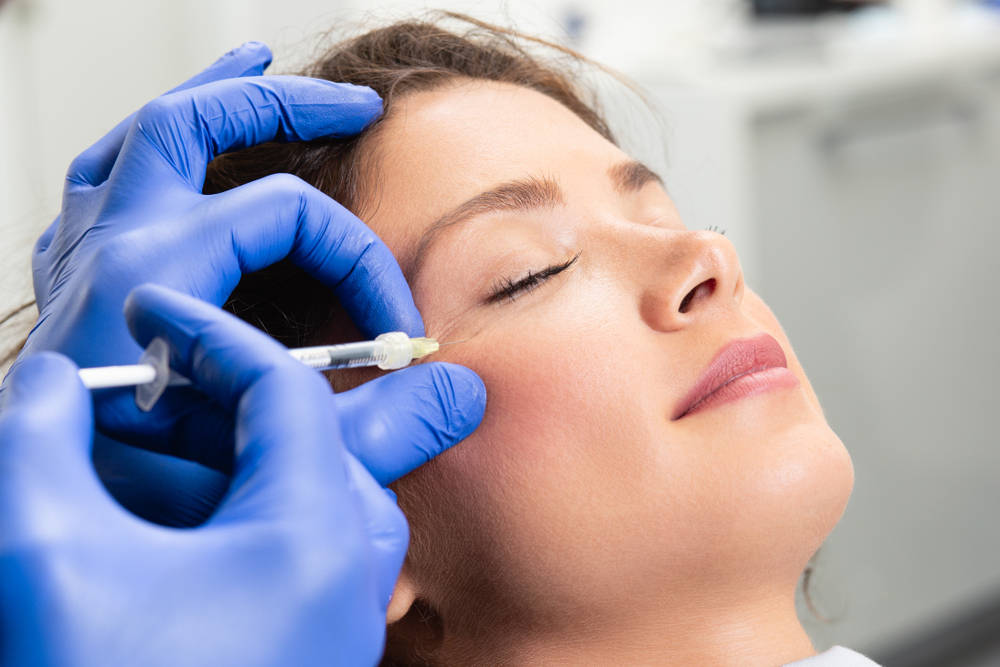 Attractive,Young,Woman,Is,Getting,A,Rejuvenating,Facial,Injections.,She